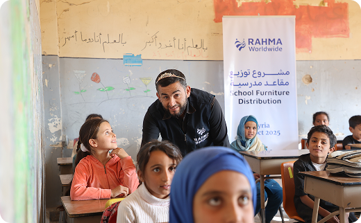 Teacher interacting with young students